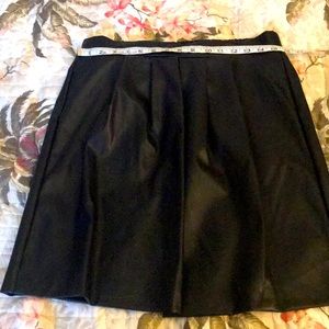 Cute black faux leather skirt!
